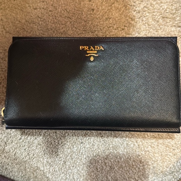 Prada wallet. Black with gold hardware. - Picture 1 of 5